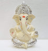 Handcrafted Silver Chandan Ganesha idol with intricate silver jewelry, symbolizing prosperity and wisdom, ideal for home decor and altars.