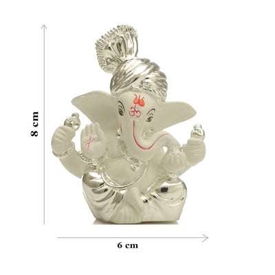 Handcrafted silver-plated Ganesha idol made of ceramic, symbolizing prosperity and blessings, ideal for home decor and altars.