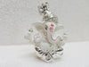 Handcrafted silver-plated Ganesha idol made of white terracotta, measuring 4L x 5W x 8.9H cm, perfect for home or car decor.