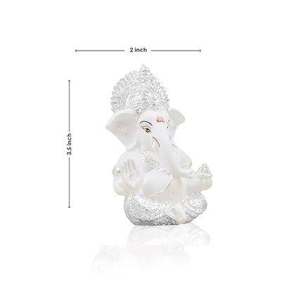 Handmade silver-plated Lord Ganesha idol, measuring 5.1 x 5.1 x 8.9 cm, featuring intricate terracotta details and lifelike eyes.