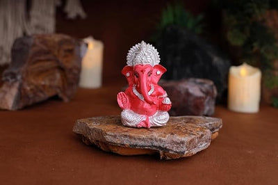 A beautifully crafted silver-plated Lord Ganesha idol made from premium resin, symbolizing prosperity and wisdom. Ideal for home or office decor.