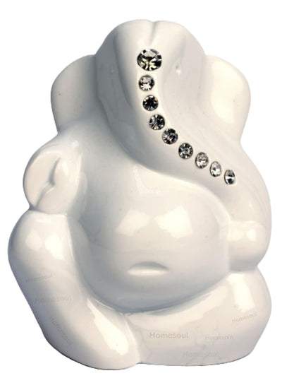 Handcrafted stone Ganesha idol, 5x5x5 cm, 500 grams, perfect for car dashboard or home altar, symbolizing prosperity and wisdom