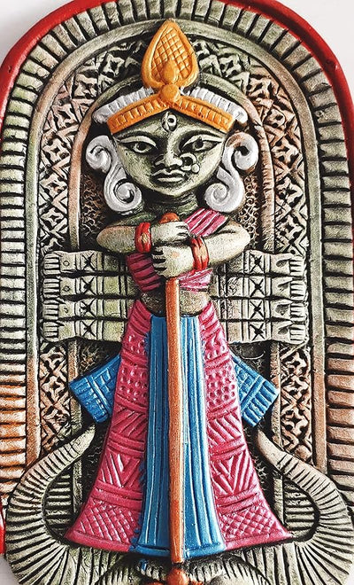 Handcrafted terracotta wall hanging of Goddess Durga, showcasing intricate details and rustic elegance, symbolizing protection and spirituality